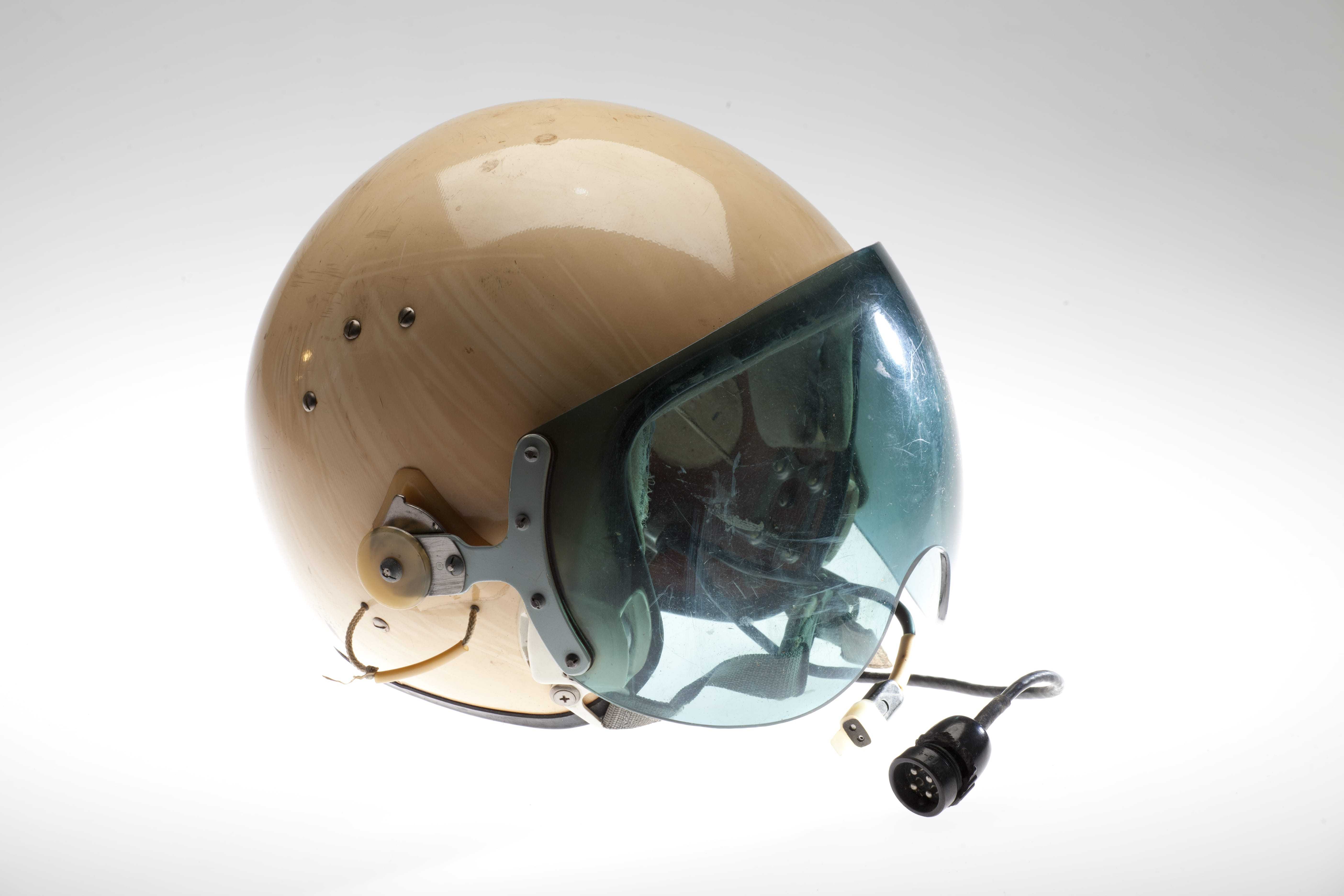 A light tan pilot's helmet from a Soviet helicopter